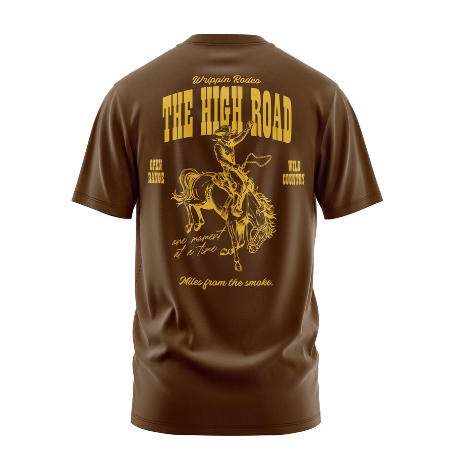 Wrippin Rodeo tee in brown — gold back graphic of a bronc rider, The High Road, Open Range Wild Country